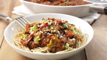 Spaghetti bolognaise met zongedroogde tomaten en Parmezaanse kaas