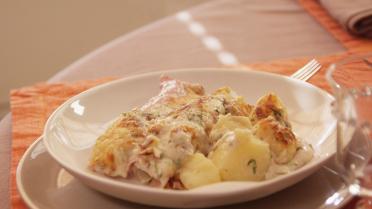 Hamrolletjes met selder en kruidenbechamel