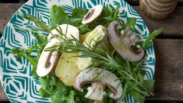 Aardappelen in de schil met gorgonzalocrème en paddenstoelen 
