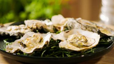 Gegratineerde oesters met champagne